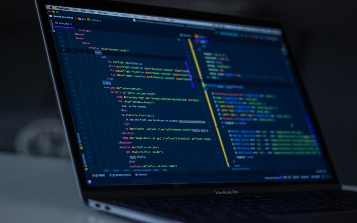 A laptop showing code